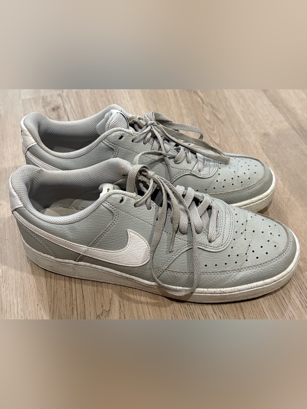 Nike Gray Leather Low-Top Sneakers with White Swoosh labeled “CP” on inside